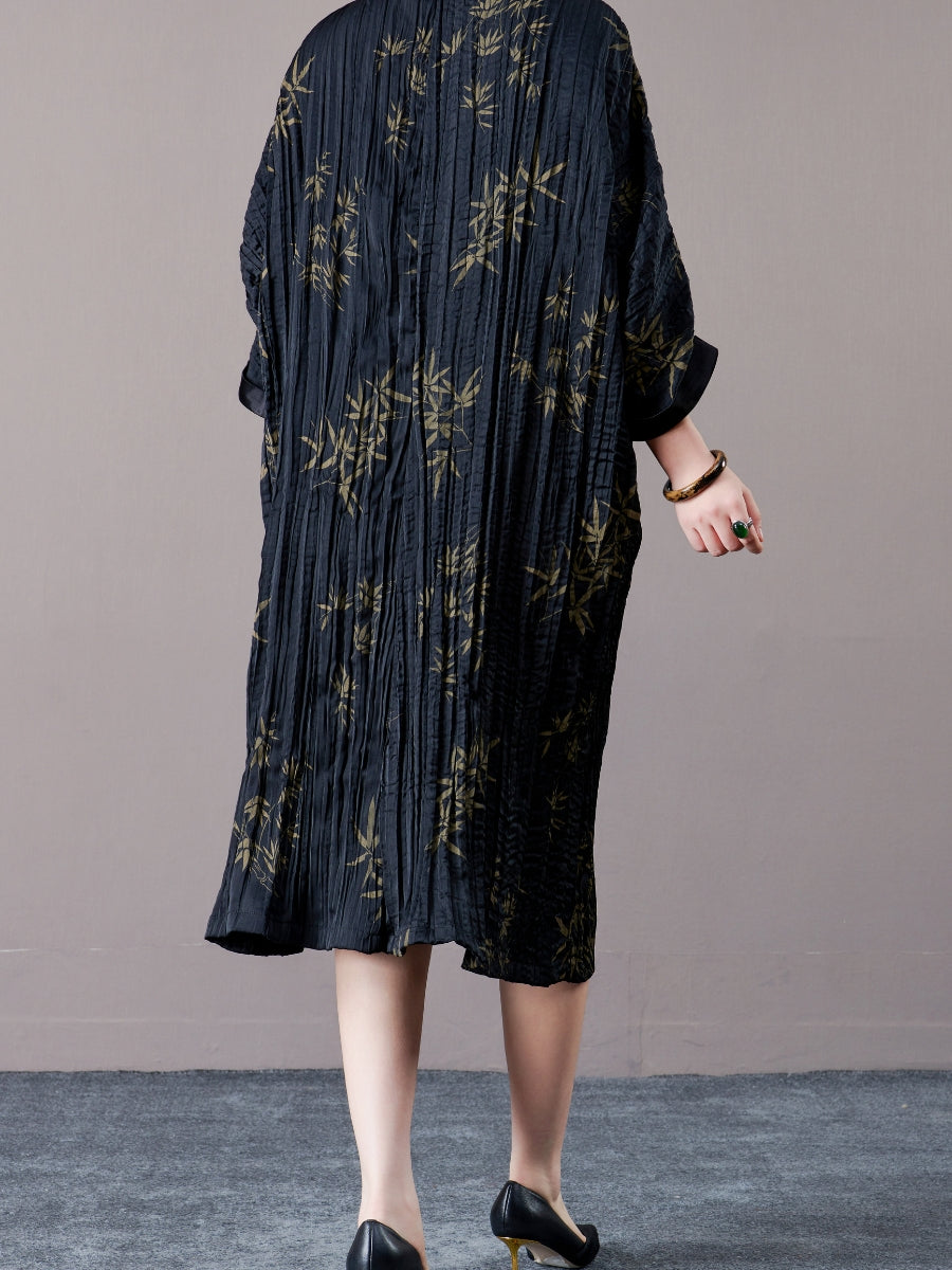 Elegant Black Pleated Maxi Dress with Golden Bamboo Motif - Image 4